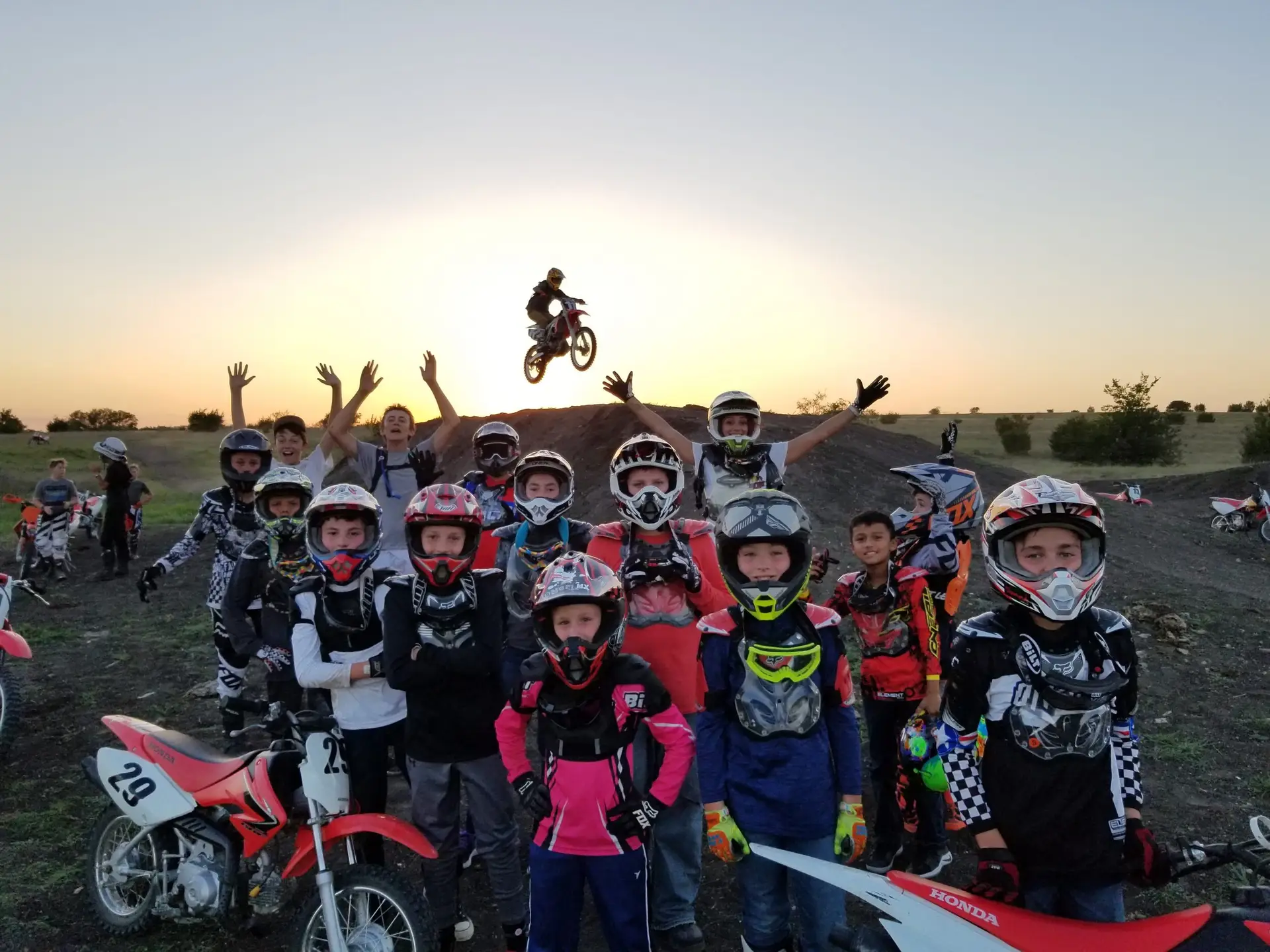 Motocross summer camp jump with kids at Iron Horse Country Ranch in Austin Texas