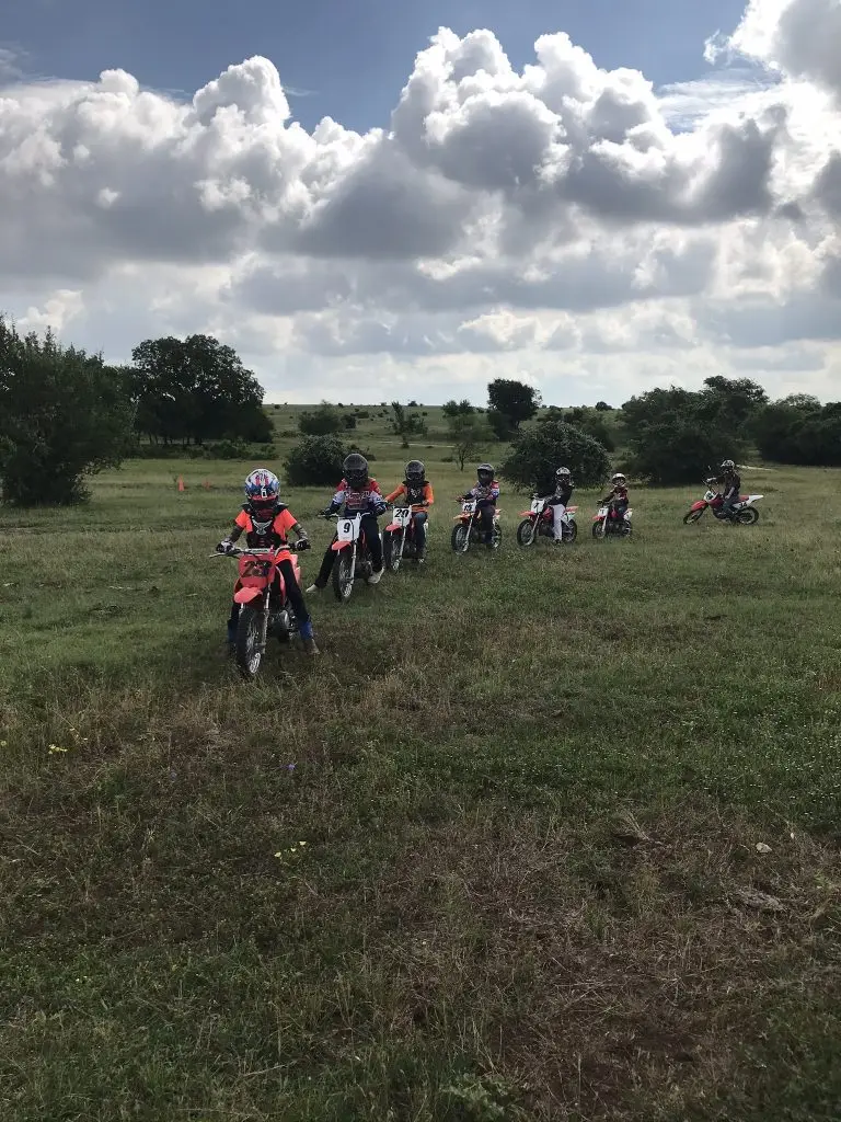 Motocross riders getting instruction at Iron Horse Country Summer Camp