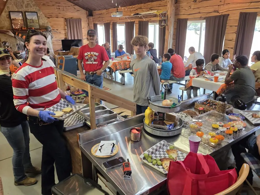 cafe at summer camp and kids playing games our youth adventure programs at Iron Horse Country