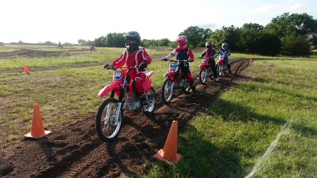 Summer Camp learning to ride dirt bike motorcycles at Iron Horse motocross summer camp