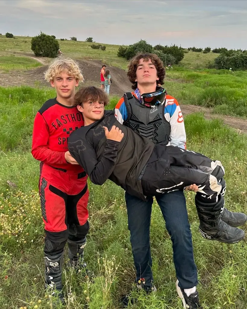 summer camp boys having fun during break at Iron Horse Country motocross ranch making friends